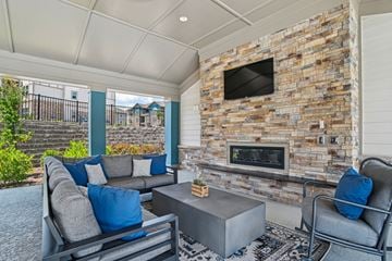 Mooresville apartment for rent - a living room with couches and a fireplace