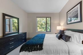 Boston apartment for rent - A bedroom with a large bed and a window.