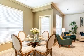 Stoughton apartment for rent - a dining room with a glass table and chairs