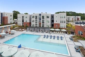 Resort-inspired pool with sundeck