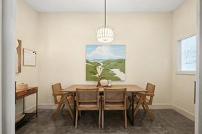 Sneads Ferry apartment for rent - a dining room with a wooden table and chairs