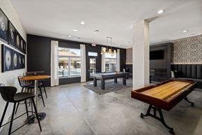 Mooresville apartment for rent - a game room with a pool table and a bar