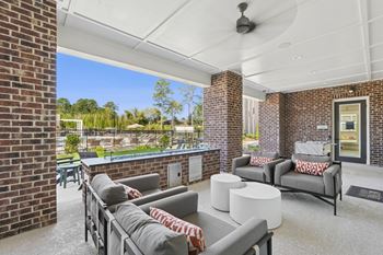 Poolside lounge with outdoor fireplace