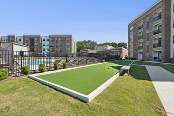 Outdoor gaming areas with bocce ball, cornhole, putting green, disc golf & pickleball court