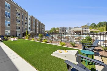 Outdoor gaming areas with bocce ball, cornhole, putting green, disc golf & pickleball court