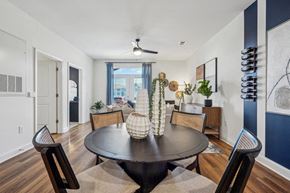 China Grove apartment for rent - A dining room with a round table and chairs.