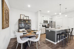 Holly Springs apartment for rent - a kitchen and dining area with a table and chairs