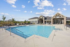 Holly Springs apartment for rent - a swimming pool with a building in the background