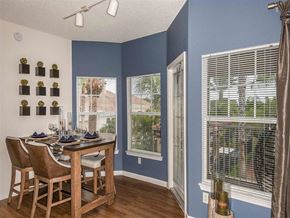 Melbourne apartment for rent - Dining room with table and windows looking out