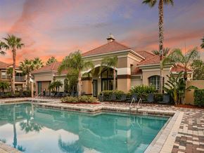 Melbourne apartment for rent - Shot of outdoor pool at sunset with palm trees