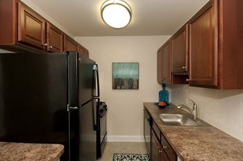 Spice oak cabinets in select apartment homes