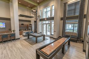 Kissimmee apartment for rent - Game Room With Billiards And Shuffleboard at Integra Sunrise Parc, Kissimmee, FL, 34746
