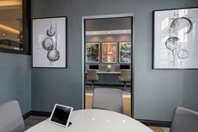 New Market apartment for rent - a conference room with a table and chairs and a on the table