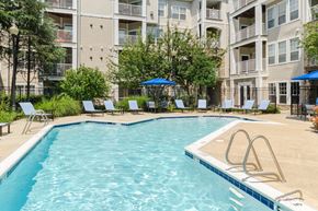 Annapolis apartment for rent - a large swimming pool with a building behind it