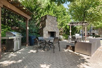 Outdoor picnic area with grilling stations