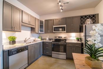 Granite countertops in kitchen and bathrooms