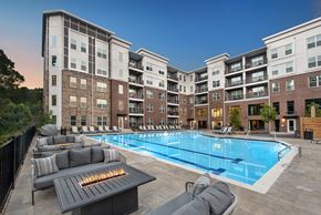 Suwanee apartment for rent - twilight pool area with firepit