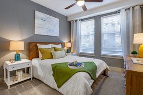 Annapolis apartment for rent - a bedroom with windows and a ceiling fan
