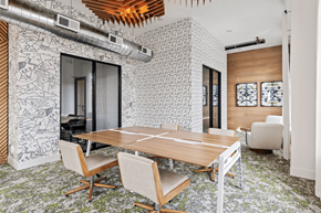 Wilmington apartment for rent - A conference room with a long table and chairs.