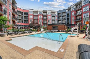Resort-style swimming pool with interactive water features