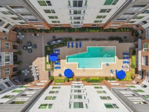 Raleigh apartment for rent - an overhead view of a swimming pool in the middle of a building