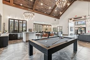 Fort Mill apartment for rent - play a game of pool in our clubhouse at our apartments
