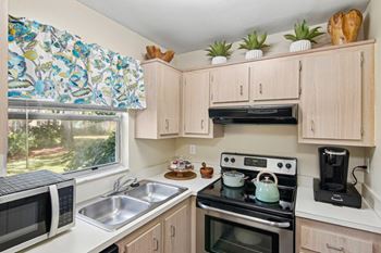 Galley kitchens with stainless steel appliances