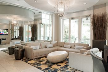 Luxury club lounge with chef-inspired kitchen, pool table