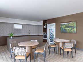 San Diego apartment for rent - Open dining space with woven back chairs at Garden at 3Roots Apartments, San Diego, CA 92126
