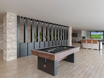 Recreation room with pool table and bar seating