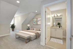 Basking Ridge apartment for rent - A bedroom with a bed, nightstand, and a mirrored cabinet.