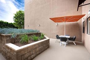 Sherman Oaks apartment for rent - Patio with a Table and Chairs at Burbank Gardens Apartments, Sherman Oaks