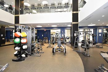 Fitness center with weight equipment and upper level
