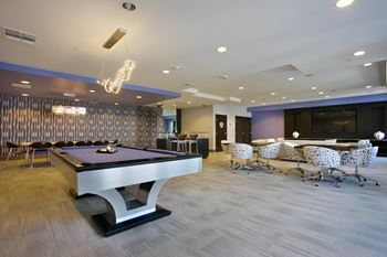 Recreation room with billiards and lounge furniture