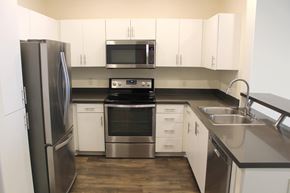 San Diego apartment for rent - Modern kitchen with stainless steel appliances at Torrey Gardens Apartments, San Diego, CA