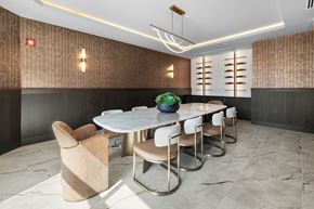 Englewood Cliffs apartment for rent - A business center with an oval table and chairs.