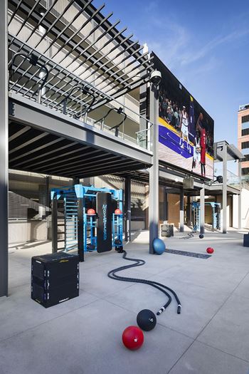 Outdoor fitness area with battle ropes and equipment