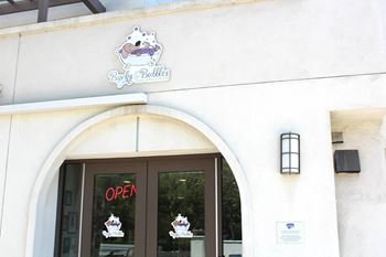 Pet grooming entrance with arched doorway