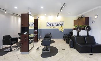 Hair salon with black chair