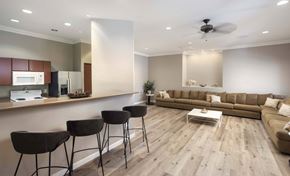 Scottsdale apartment for rent - A modern living room with a kitchen area at Vintage at Scottsdale, Arizona