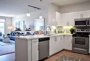 San Diego apartment for rent - Open concept kitchen with island and living area at 360 Luxury Apartments, California