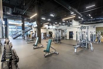 Spacious fitness center with strength training equipment
