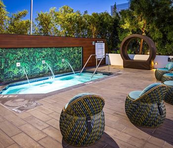Spa with lounge seating and circular sculpture