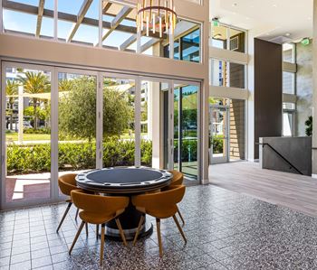 Game room with poker table and skylights