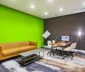 Workspace with desk and lounge seating area