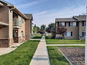 Laramie apartment for rent - A residential area with houses and a sidewalk.