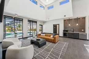 Clearfield townhouse for rent - A modern living room with a pool view.
