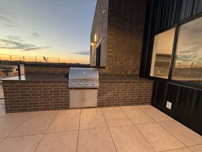 Idaho Falls apartment for rent - A small white fridge on a patio.