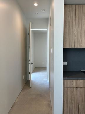 Salt Lake City apartment for rent - a hallway in a home with white walls and doors