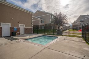 Rexburg apartment for rent - a pool at the whispering winds apartments in pearland, tx